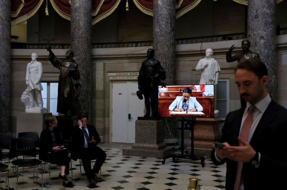 A live video feed of the House chamber is shown in the Capitol's Statuary Hall on Thursday.