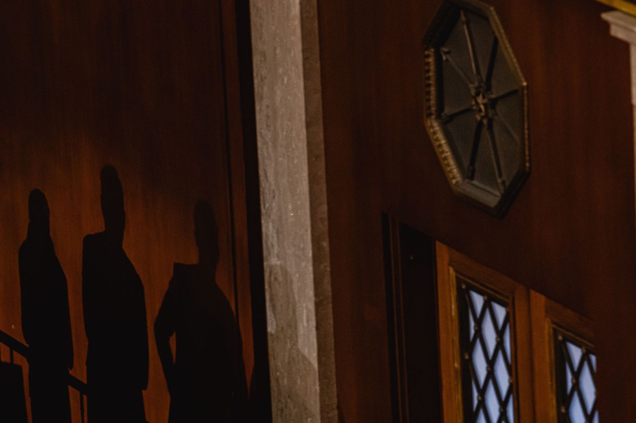Shadows of lawmakers are cast on the House chamber wall on Thursday.