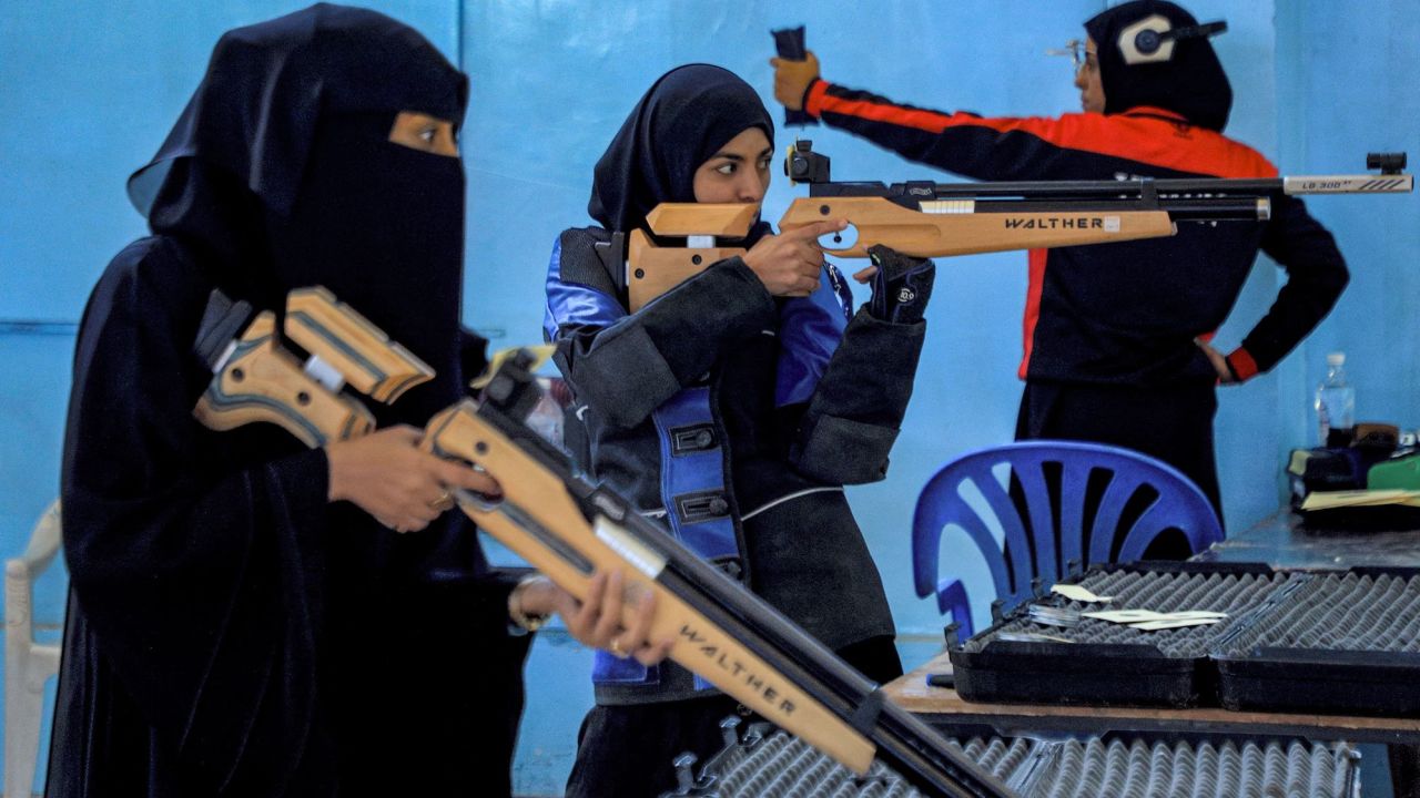 Women athletes aim their air rifles while competing in a local shooting championship in Yemen's Houthi rebel-held capital Sanaa on January 3.