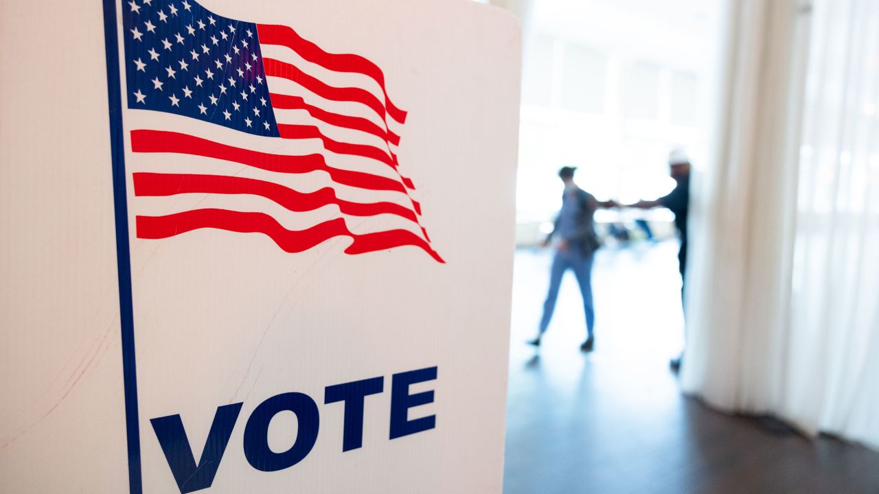 ATLANTA, GA - MAY 24: Voters leave the Park Tavern polling location after casting their ballots in the Georgia primary election on May 24, 2022 in Atlanta, Georgia. Voters across Georgia will be voting on several positions, including U.S. Senate seats, Georgia Secretary of State, and the Governor position.