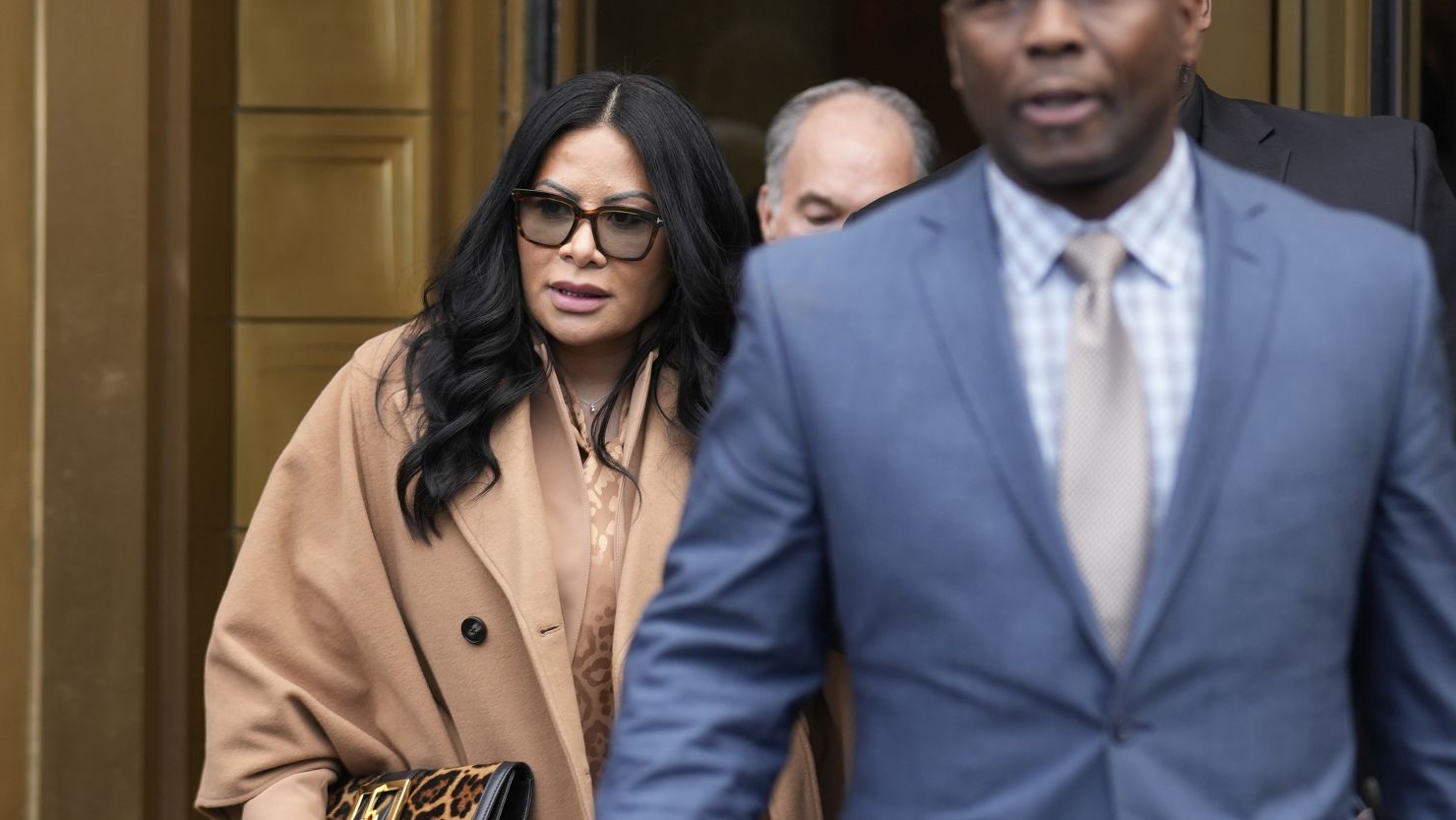 Jennifer Shah leaves a federal court in New York on January 6, 2023. A judge has sentenced Shah, a member of "The Real Housewives of Salt Lake City," to 6 and a half years in prison for helping to defraud thousands of people nationwide in a telemarketing scam. 