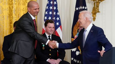 President Joe Biden shakes hands with U.S. Capitol Police Sgt. Aquilino Gonell as he speaks about Gonell in the East Room of the White House in Washington, Friday, Jan. 6, 2023, during a ceremony to mark the second anniversary of the Jan. 6 assault on the Capitol and to award Presidential Citizens Medals. Washington Metropolitan Police Department officer Daniel Hodges looks on at center. 