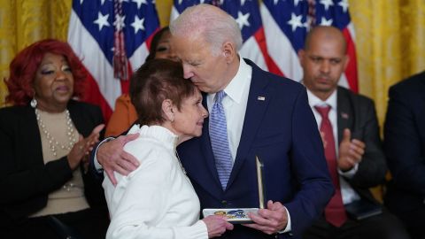US President Joe Biden awards the Presidential Citizens Medal to US Capitol Police Officer Brian D. Sicknick whose mother Gladys Sicknick, accepts on his behalf, during a ceremony marking the second anniversary of the January 6, 2021 attack on the US Capitol, in the East Room of the White House in Washington, DC, on January 6, 2023.