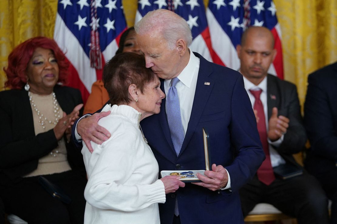 President Joe Biden awards the Presidential Citizens Medal to US Capitol Police Officer Brian D. Sicknick, whose mother Gladys Sicknick accepts on his behalf.