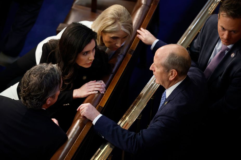 Bishop, who had previously voted against McCarthy but backed him Friday, talks to fellow GOP Rep. Mary Miller and Rep.-elect Anna Paulina Luna.