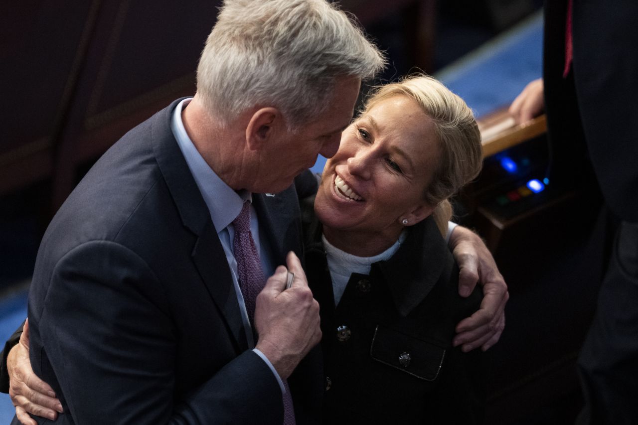 UNITED STATES - JANUARY 6: Rep. Marjorie Taylor Greene, R-Ga., greets Republican Leader Kevin McCarthy, R-Calif., on the floor after the House votes to adjourn until 10pm on Friday, January 6, 2023. He did not receive enough votes for Speaker of House in prior votes. (Tom Williams/CQ-Roll Call, Inc via Getty Images)