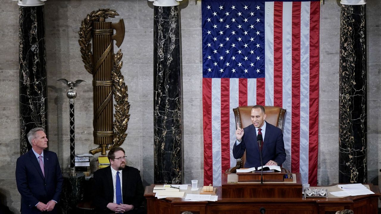 Representative Hakeem Jeffries, a Democrat from New York, speaks during a meeting of the 118th Congress with Representative Kevin McCarthy, a Republican from California, left, in the House Chamber at the US Capitol in Washington, DC, US, Saturday, Jan. 7, 2023. McCarthy achieved his long-held ambition of becoming House speaker after quelling a rebellion by GOP conservative hardliners, but at the cost of further weakening his precarious position within a sharply divided party. Photographer: Al Drago/Bloomberg via Getty Images