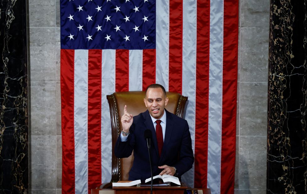 Jeffries speaks from the dais as he prepares to hand the gavel to McCarthy on Saturday.