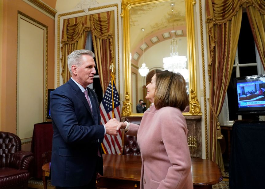 McCarthy shakes hands with his predecessor, Nancy Pelosi, after being elected Speaker of the House on Saturday.