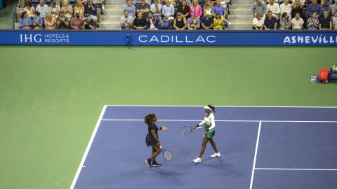 Venus and Serena played successful  the women's doubles gully  astatine  the 2022 US Open.
