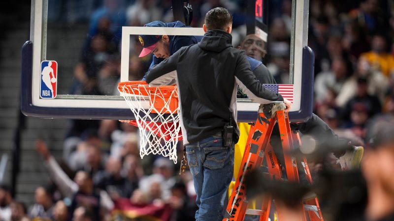 Denver Nuggets game delayed again because of crooked rim | CNN