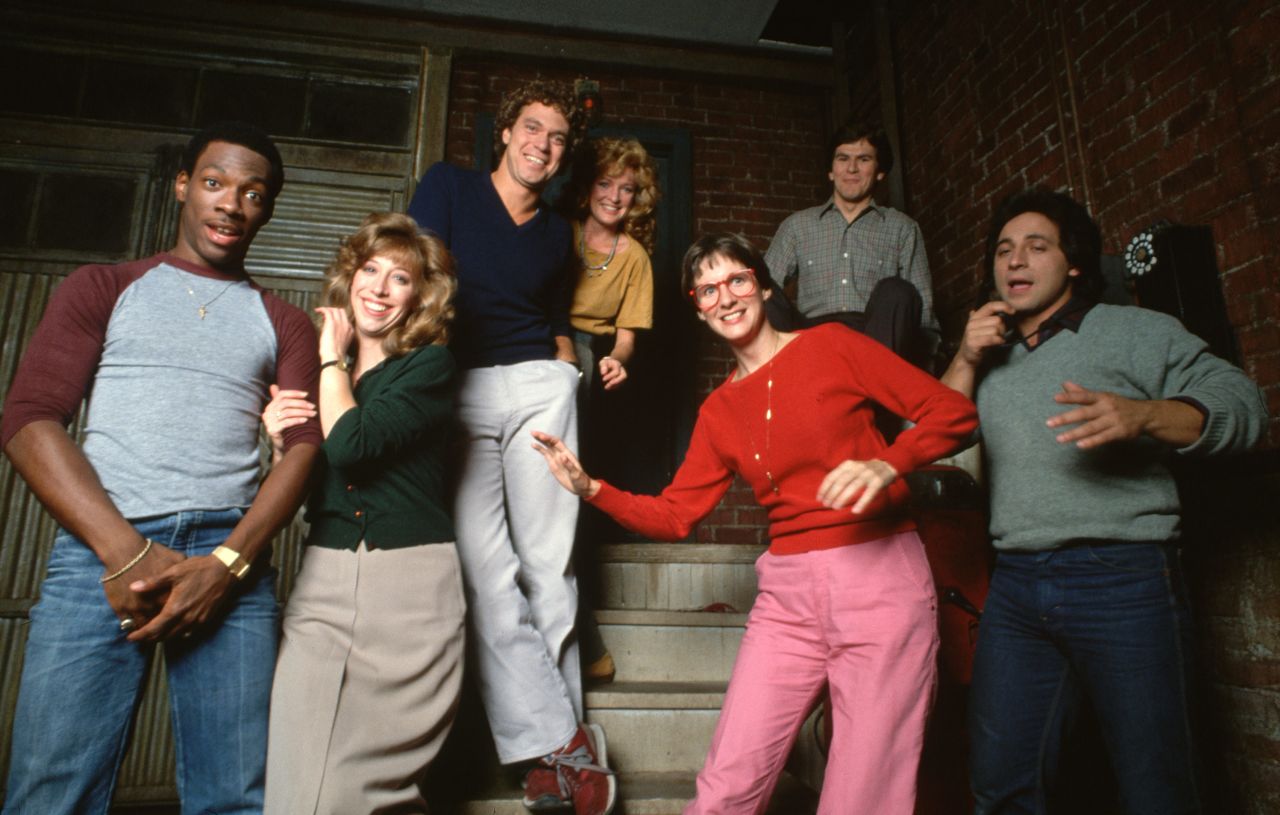 Murphy poses for a photo with fellow "Saturday Night Live" cast members in 1981. From left are Murphy, Robin Duke, Joe Piscopo, Christine Ebersole, Mary Gross, Tim Kazurinsky and Tony Rosato.
