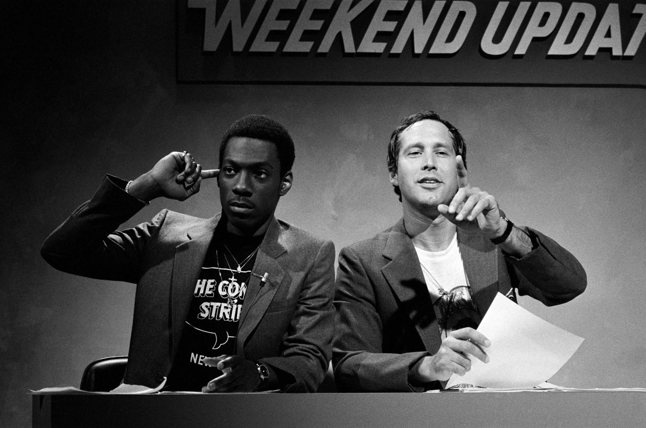 Murphy and Chevy Chase appear in a "Weekend Update" segment of "SNL" in 1981.