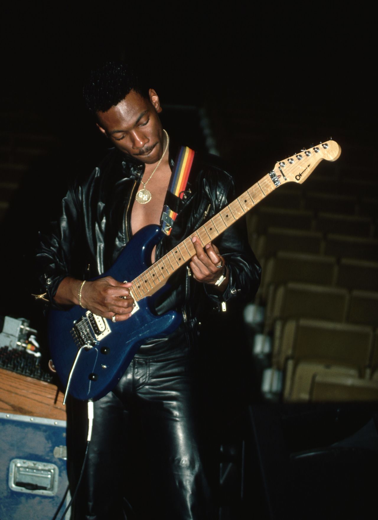 Murphy plays guitar in one of his trademark leather jumpsuits in 1983. Murphy has had Billboard Hot 100 singles: "Party All the Time" in 1985 and "Put Your Mouth on Me" in 1989.