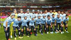 AGUASCALIENTES, MEXICO - JANUARY 06: Players of Necaxa pose wearing blue hats as a tribute to 'Don Ramon' character of Mexican sitcom 'El Chavo del 8' prior the 1st round match between Necaxa and Atletico San Luis as part of the Torneo Clausura 2023 Liga MX at Victoria Stadium on January 6, 2023 in Aguascalientes, Mexico. (Photo by Leopoldo Smith/Getty Images)