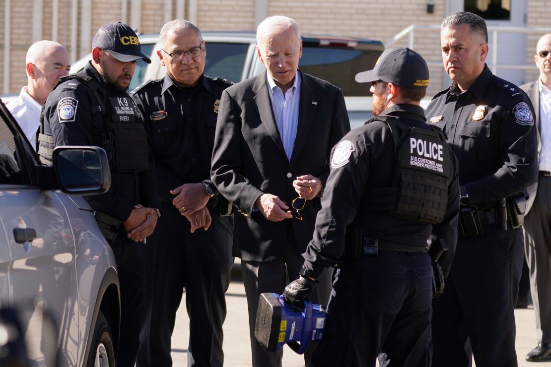 U.S. Customs and Border Protection officers shows President Joe Biden a portable X-ray device as he tours El Paso port of entry, Bridge of the Americas, a busy port of entry along the U.S.-Mexico border, in El Paso Texas, Sunday, Jan. 8, 2023. (AP Photo/Andrew Harnik)