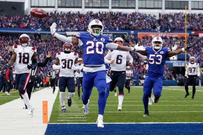 Buffalo Bills running back Nyheim Hines scores a touchdown on a kickoff return during the first half against the New England Patriots. <a href="index.php?page=&url=https%3A%2F%2Fedition.cnn.com%2F2023%2F01%2F09%2Fsport%2Fbuffalo-bills-nyheim-hines-touchdown-damar-hamlin-spt-intl%2Findex.html" target="_blank">Hines' touchdown</a> -- his first of two against New England -- came in the Bills' first play since Damar Hamlin collapsed and suffered a cardiac arrest. 