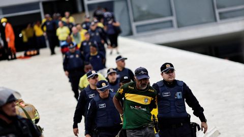 Pro-Bolsonaro protesters detained by security forces on Sunday.
