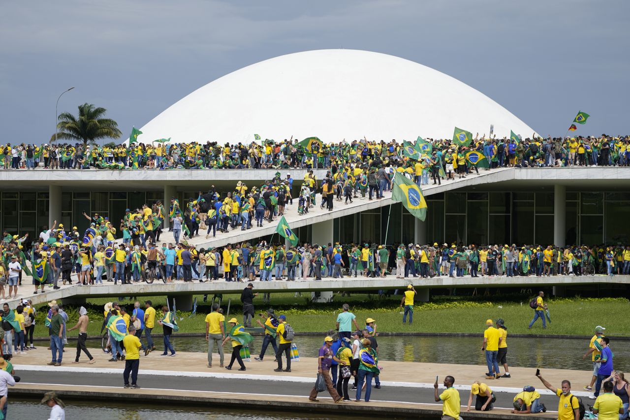 Supporters of former President Jair Bolsonaro storm the the National Congress building in Brasilia.