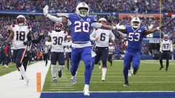 Buffalo Bills running back Nyheim Hines (20) scores a touchdown on a kickoff return during the first half of an NFL football game against the New England Patriots on Sunday, Jan. 8, 2023, in Orchard Park, N.Y. (AP Photo/Joshua Bessex)