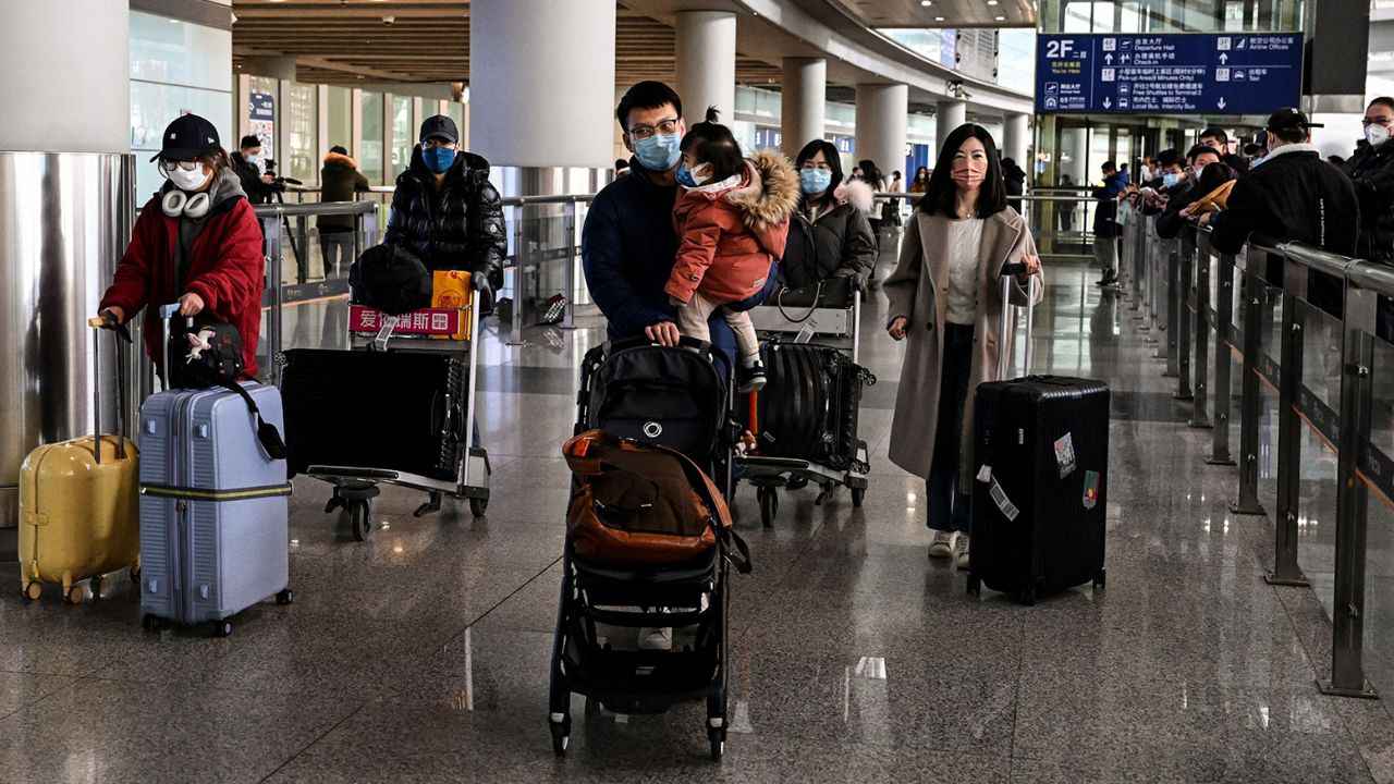 Passengers are seen in the arrivals area for international flights at the Capital International Airport in Beijing on January 8, 2023. 