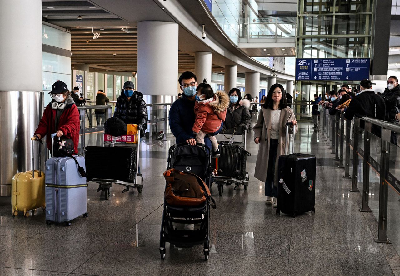 Passengers are seen in the arrivals area for international flights at the Capital International Airport in Beijing on January 8, 2023. 