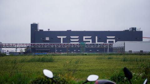 A Tesla sign is seen at its factory in Shanghai, China, on May 13, 2021.