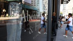 People walk past an Abercrombie & Fitch store on Fifth Avenue on August 25, 2022 in New York City. 