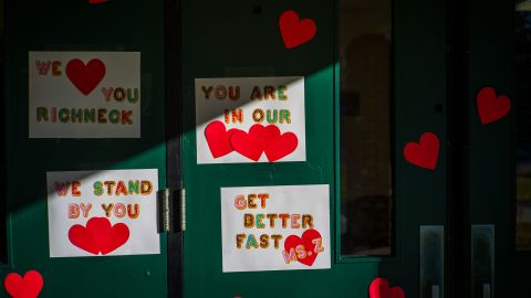 Messages of support for teacher Abby Zwerner, who police say was shot by a 6- year-old student, are fixed to the front door of Richneck Elementary School on Monday.