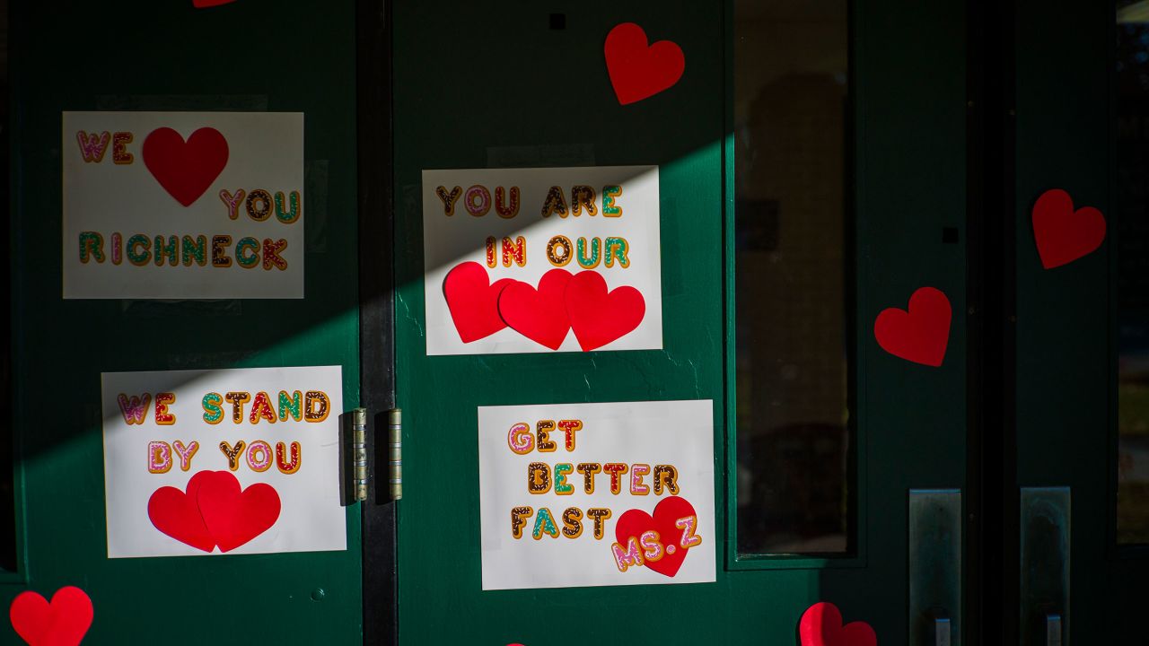 Messages of support for teacher Abby Zwerner, who police say was shot by a 6- year-old student, are fixed to the front door of Richneck Elementary School.