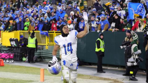 Amon-Ra St. Brown of the Detroit Lions greets fans aft  defeating the Green Bay Packers astatine  Lambeau Field Sunday successful  Green Bay, Wisconsin. 