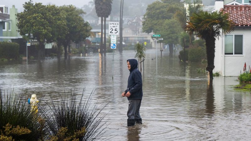 Thousands urged to flee their homes as storm wallops California, closing down roads, prompting water rescues and leaving 1 dead | CNN
