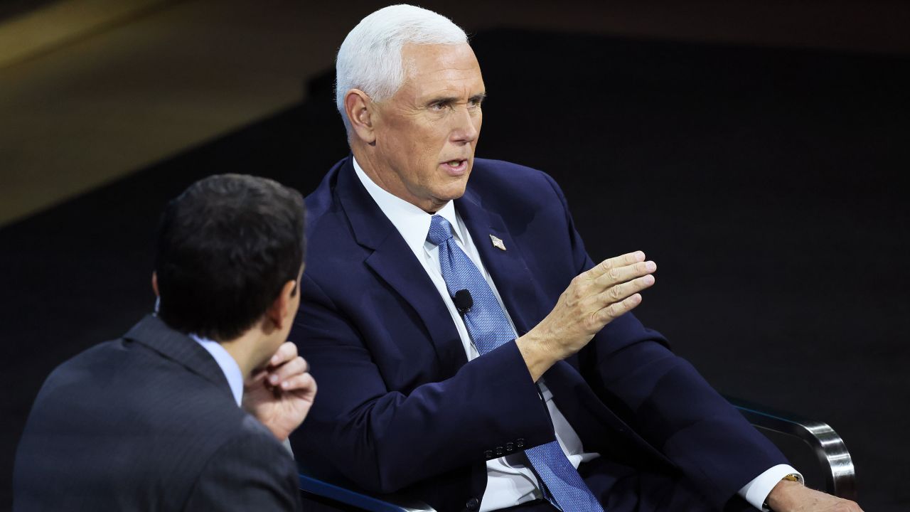 Andrew Ross Sorkin speaks with former Vice President Mike Pence during the New York Times DealBook Summit on November 30, 2022, in New York City.