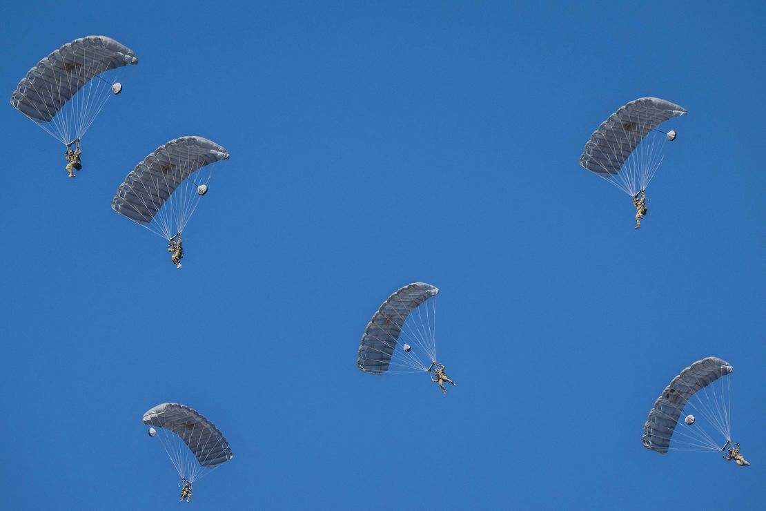 Paratroopers take part in a joint military drill among Japan, the US, Britain and Australia at Narashino exercise field in Chiba prefecture on January 8, 2023.