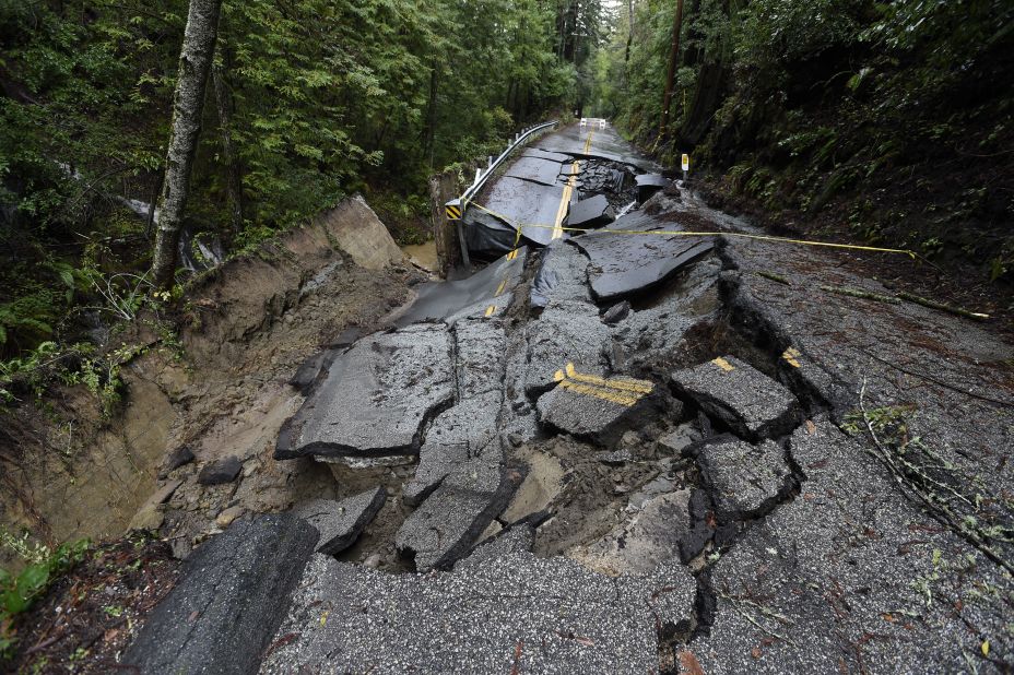 A road is damaged Monday in Scotts Valley.