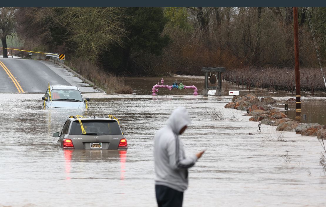 Cars are submerged in floodwater after heavy rain moved through Windsor, California, on Monday.