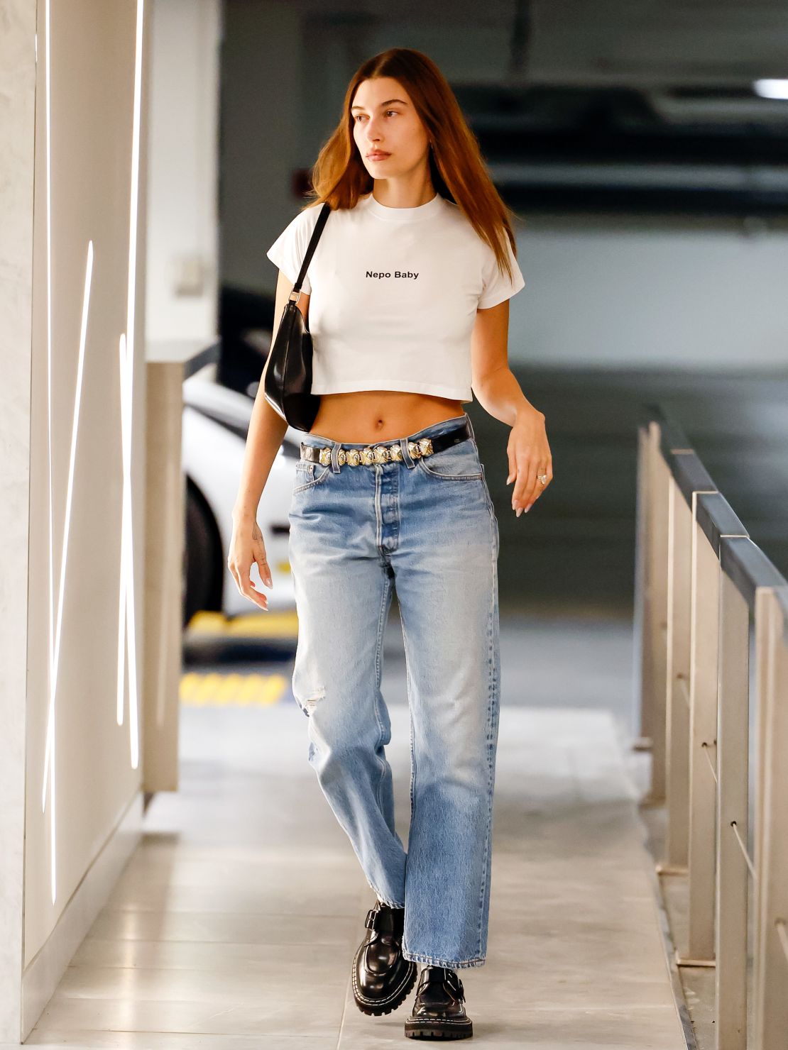Hailey Bieber spotted in a "nepo baby" crop top in LA. 