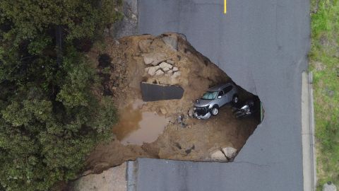 Several people had to be rescued after two vehicles fell into a sinkhole in Chatsworth, California, on January 10, 2023.