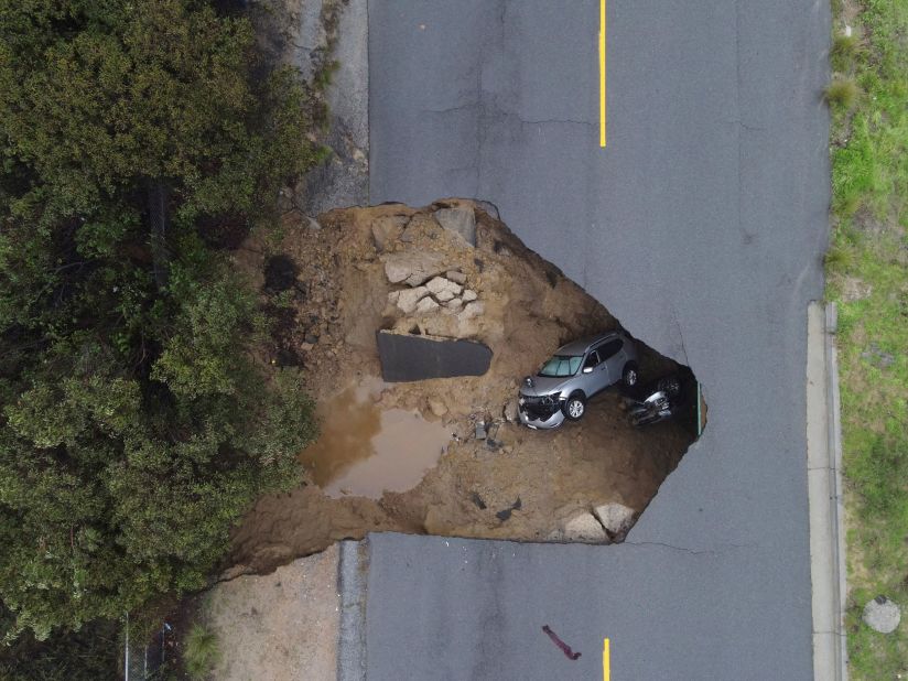 Several people had to be rescued after two vehicles fell into this sinkhole in Chatsworth on Tuesday.