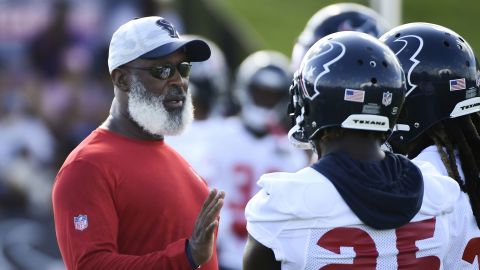 Smith talks with players during practice.