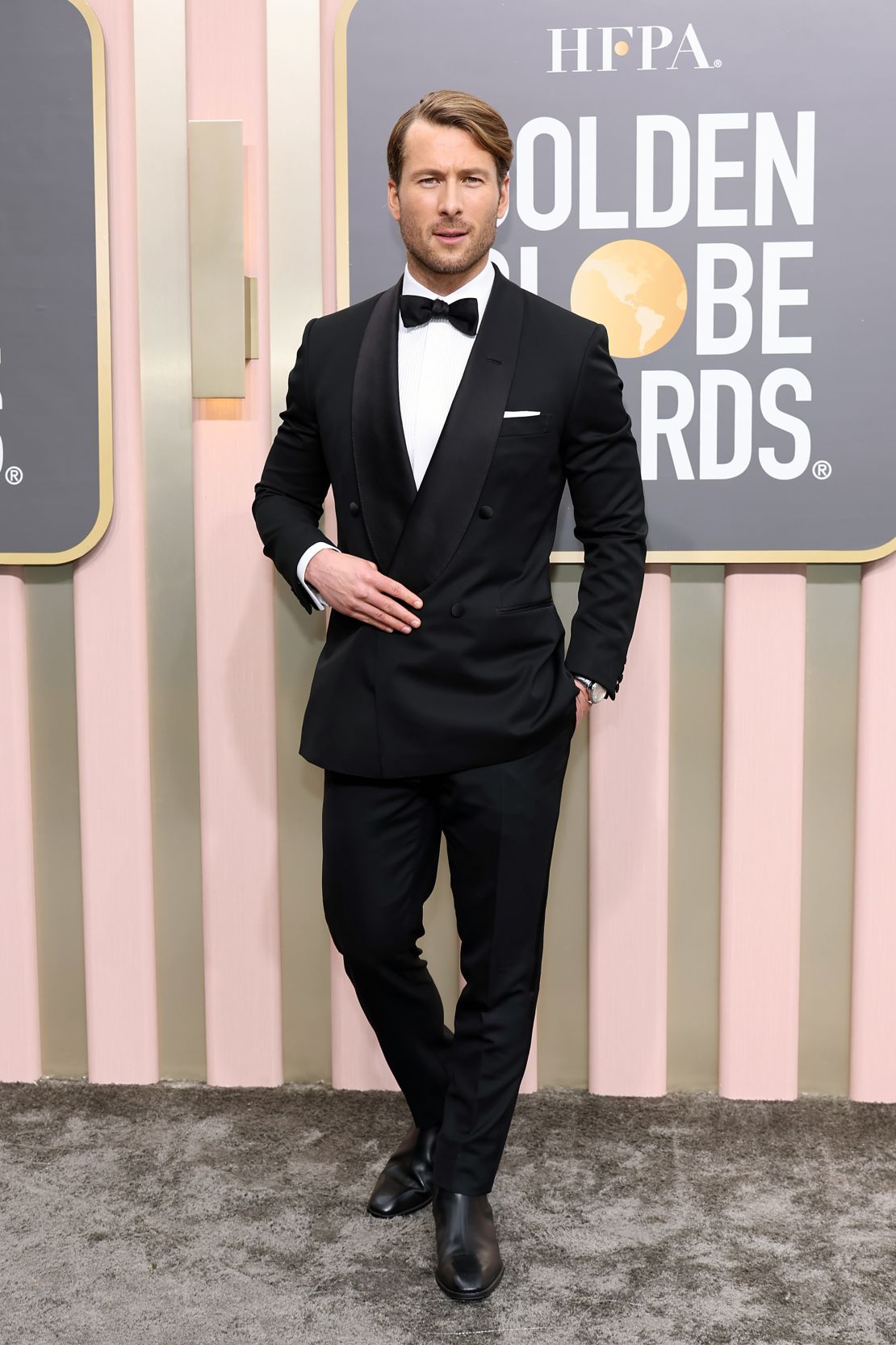 Glen Powell opted for a classic tuxedo.