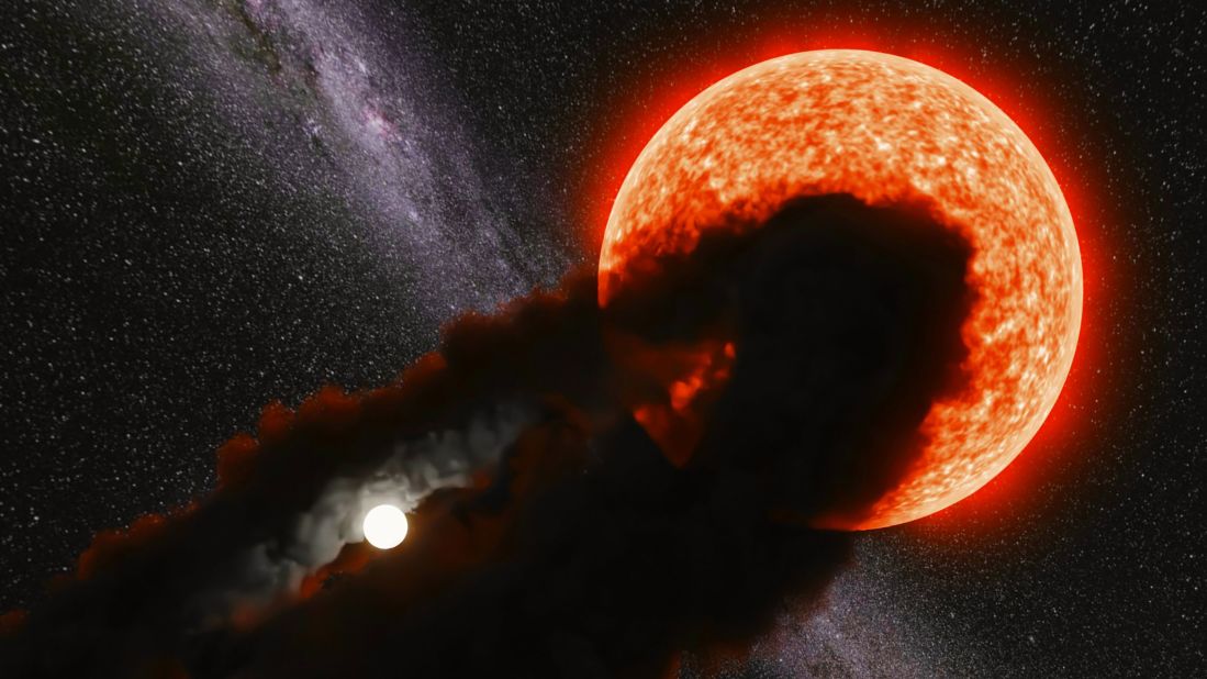 This artist's illustration shows the large, puffy star Gaia17bpp being partially eclipsed by a dust cloud that surrounds its mysterious smaller companion star.