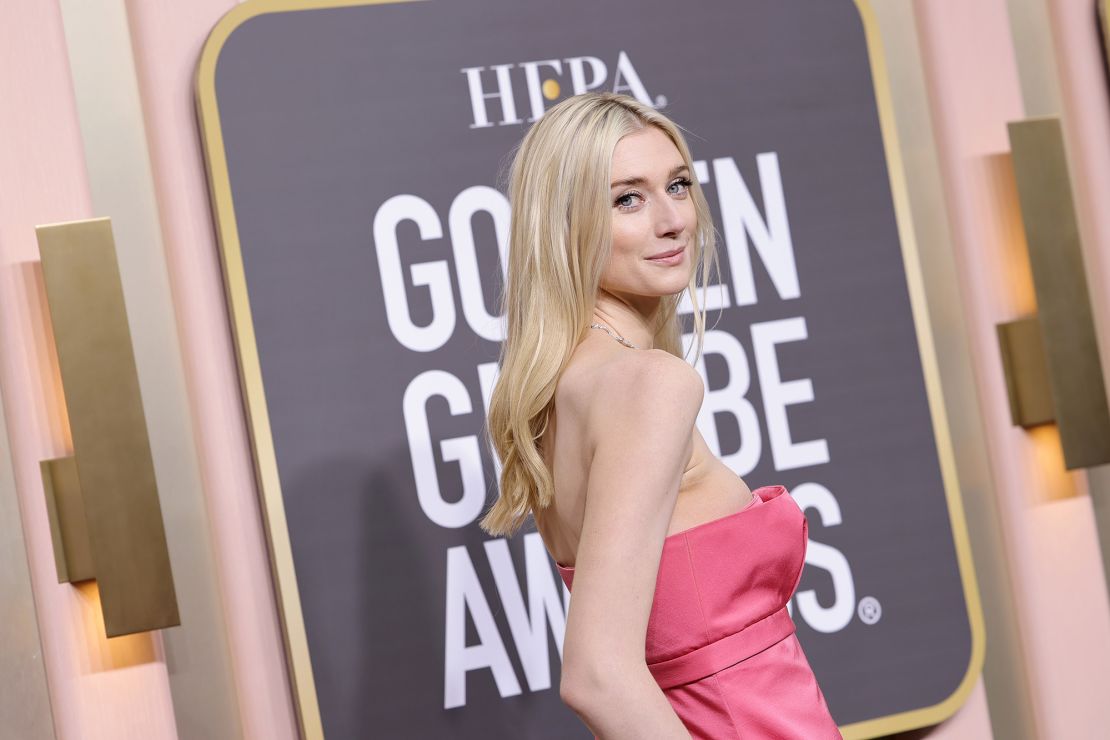 Elizabeth Debicki arrived in a pink silk strapless dress by Dior, as well as a diamond necklace by the label's jewelry division.