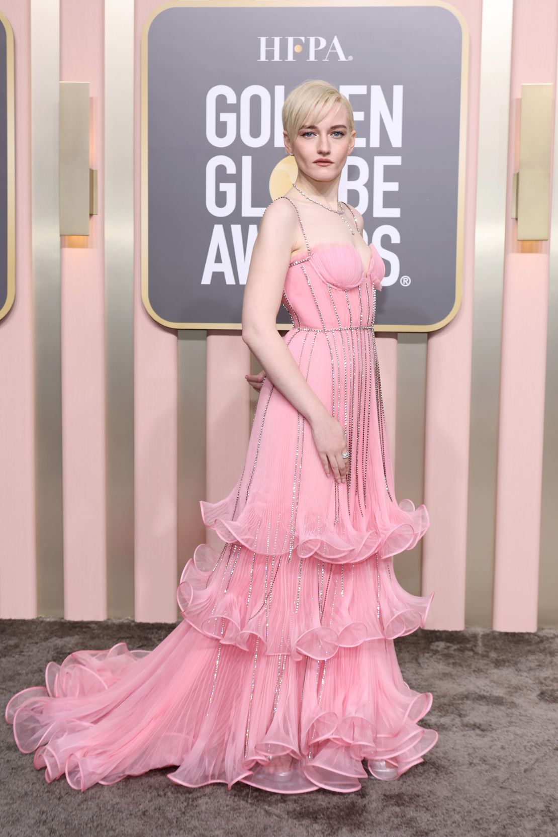Double nominee Julia Garner in a three-tiered Gucci gown and jewelry by De Beers.