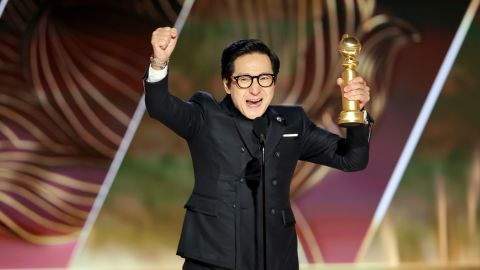 Ke Huy Quan accepts the best supporting actor in a motion picture award for "Everything Everywhere All at Once" onstage at the 80th Annual Golden Globe Awards. 