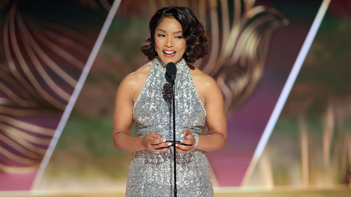 Angela Bassett accepts the best supporting actress in a motion picture Golden Globe award for 'Black Panther: Wakanda Forever' on Tuesday.