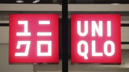 The trademark of UNIQLO is seen at Ginza district in Chuo Ward, Tokyo on October 17, 2021. UNIQLO CO., LTD. is a Japanese casual wear designer, manufacturer and retailer. The company is a wholly owned subsidiary of Fast Retailing Co., Ltd.( The Yomiuri Shimbun via AP Images )