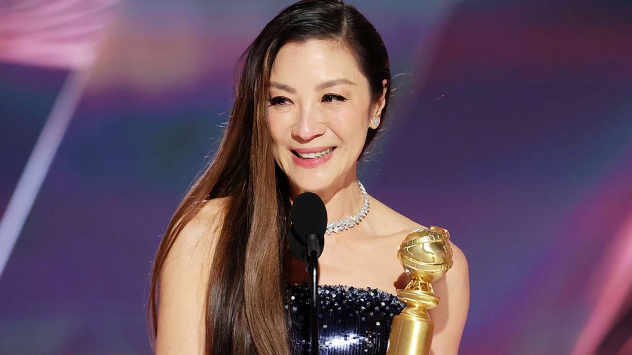 Michelle Yeoh accepts the best actress in a motion picture -- musical or comedy award for "Everything Everywhere All at Once" at the Golden Globe Awards on Tuesday.