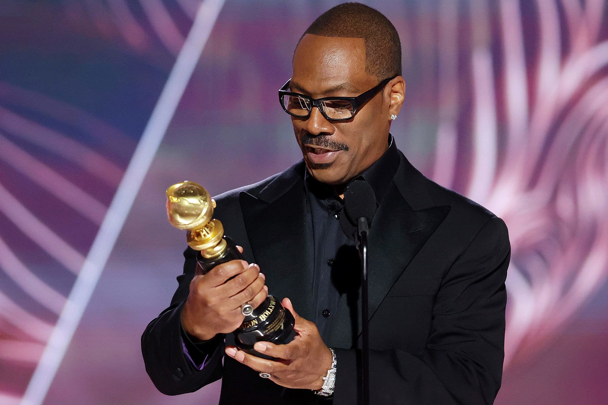 Murphy accepts the Cecil B. DeMille Award at the 2023 Golden Globe Awards.