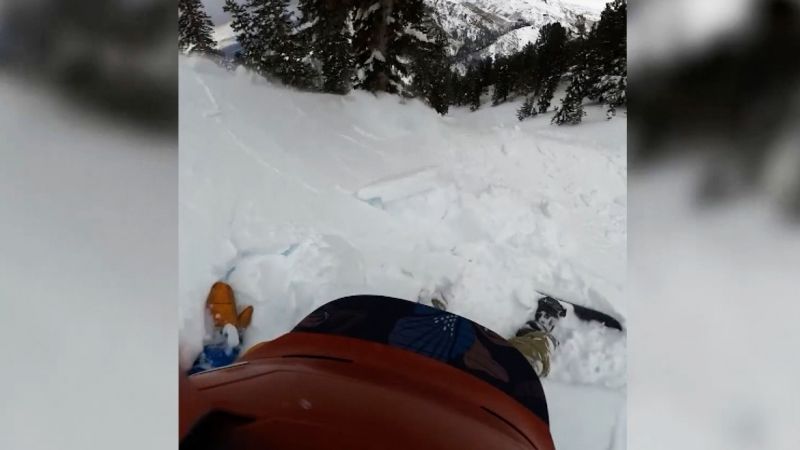 Watch: Snowboarder swept away by avalanche, POV video shows | CNN